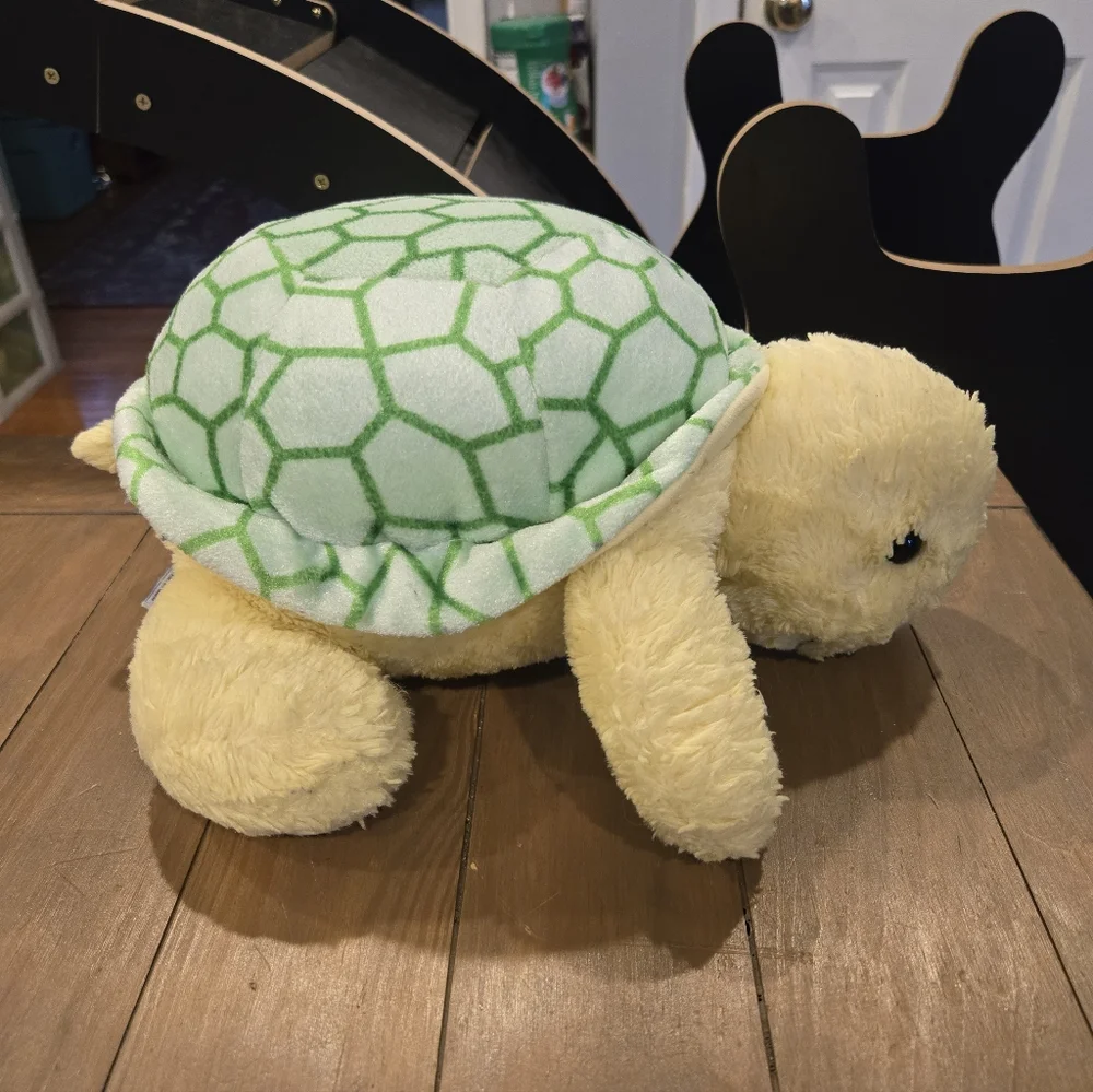 Plush Aurora Turtle Toy with Green Shell
